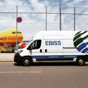 EBISS logistics van at Stuttgart airport with air freight aircraft, for road freight and air freight shipments